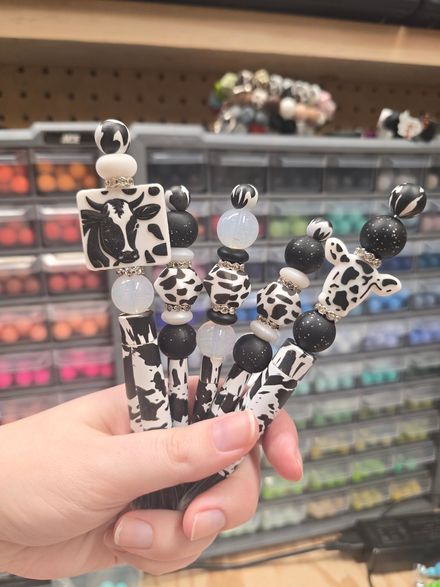 Silicone beaded makeup brushes, cowprint makeup brushes, pink makeup brushes, black makeup brushes, focal bead makeup brushes