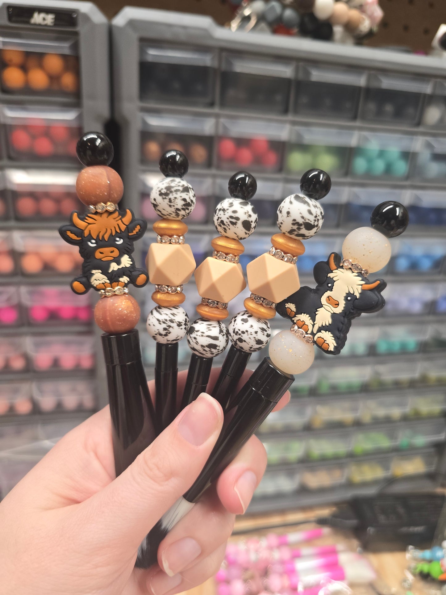 Silicone beaded makeup brushes, cowprint makeup brushes, pink makeup brushes, black makeup brushes, focal bead makeup brushes
