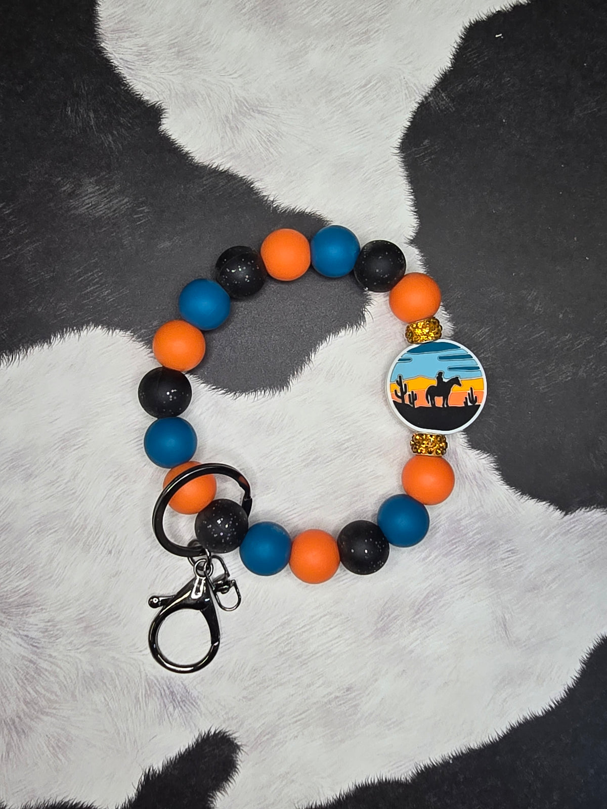 Riding off in the Sunset Wristlet
