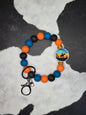 Riding off in the Sunset Wristlet